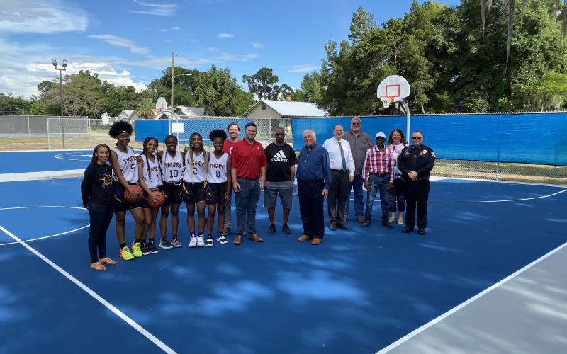 A grand opening for the new basketball courts at Youngs Park was held Thursday night with members of the Columbia High School girls basketball team, representatives of Target and City of Lake City officials. (COURTESY)