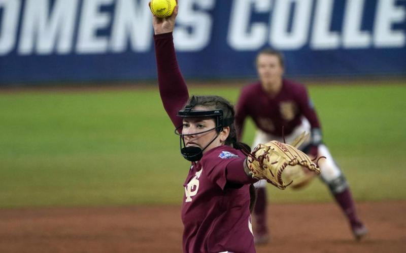 Florida State pitcher Kathryn Sandercock delivers a pitch against Alabama in the seventh inning of Sunday's Women's College World Series in Oklahoma City. (SUE OGROCKI/Associated Press)