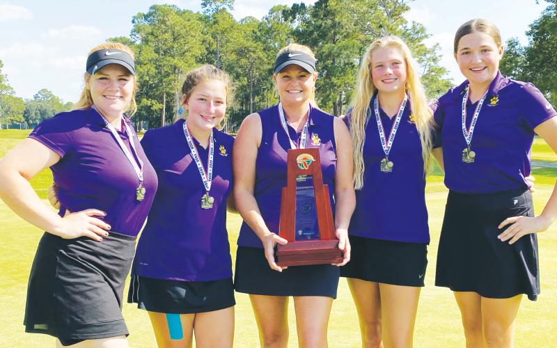 Columbia’s girls golf team won the District 2-2A title this past season, the first since 2014. at Quail Heights. Coach Tammy Winnett (middle) resigned as the team's coach on Tuesday. (FILE)