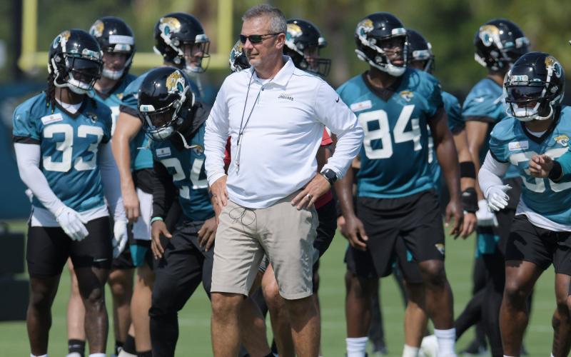 Jacksonville Jaguars head coach Urban Meyer stands on the sidelines during drills at minicamp on June 15. The NFL fined Meyer and the Jaguars for violations of league rules on non-contact practices. (TRIBUNE NEWS SERVICE)