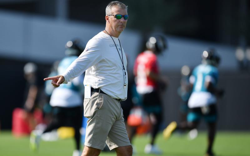 Jacksonville Jaguars head coach Urban Meyer directs players during the first day of training camp on Wednesday at the team's practice fields outside TIAA Bank Field in Jacksonville. (BOB SELF/The Florida Times-Union/TNS)