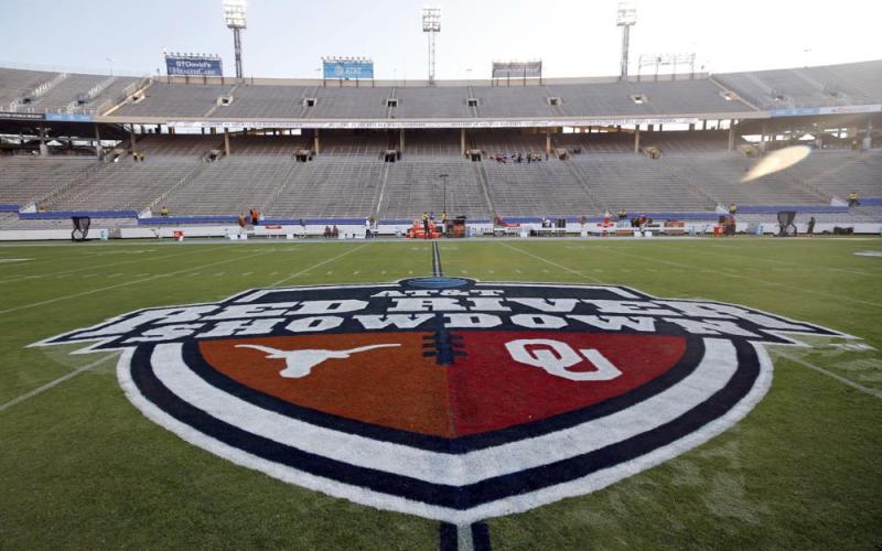 The Red River Showdown logo is displayed on the field of the Cotton Bowl, prior to a game between Texas and Oklahoma on Oct. 10, 2020, in Dallas. (AP FILE)