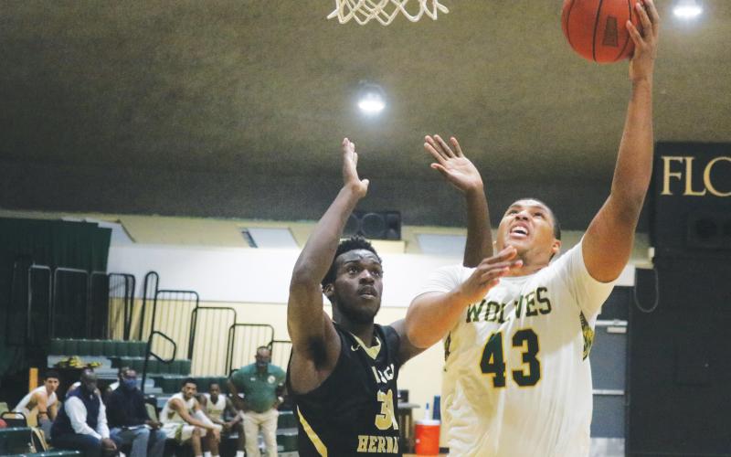 FGC center Jarrett Gardner goes up for a shot against Pasco-Hernando State College during a game on March 4. (JORDAN KROEGER/Lake City Reporter)