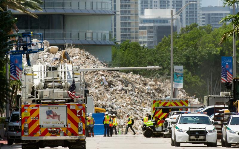 Workers search the site of the collapsed Champlain Towers South building in Surfside on July 11. The search was called off Friday after a month of painstaking work. (MEGHAN McCARTHY/Palm Beach Post/TNS)