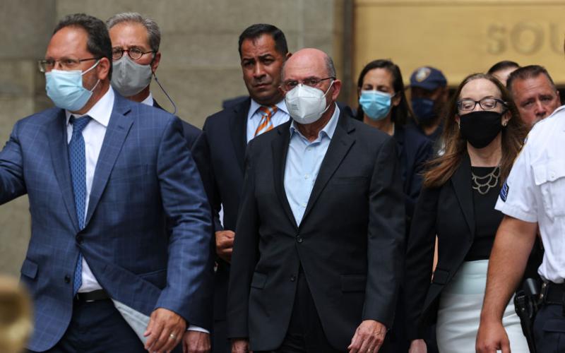 Allen Weisselberg (middle), Trump Organization CFO, leaves Manhattan Criminal Court after his arraignment in State Supreme Court on July 1, 2021 in Lower Manhattan in New York City. (MICHAEL M. SANTIAGO/Getty Images/TNS)