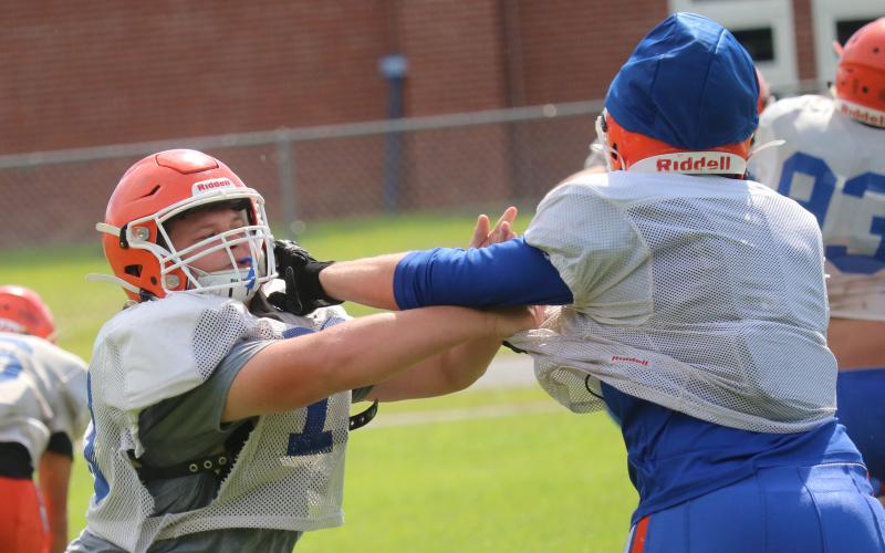 Branford offensive lineman John Coker blocks during practice on Friday. (JAMIE WACHTER/Lake City Reporter)