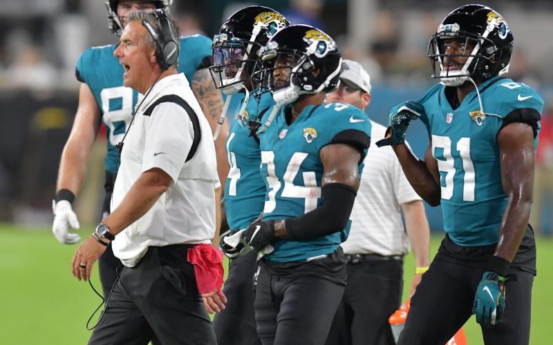 Jacksonville Jaguars head coach Urban Meyer tries to get his players attention late in the third quarter of play of Saturday’s preseason game against the Cleveland Browns at TIAA Bank Field in Jacksonville. (TRIBUNE NEWS SERVICE)