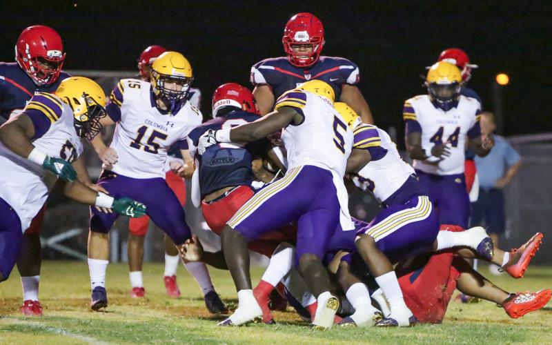 Columbia linebacker Jaden Robinson (5) makes a tackle against Vanguard during the Preseason Classic on Aug. 20. (BRENT KUYKENDALL/Lake City Reporter)