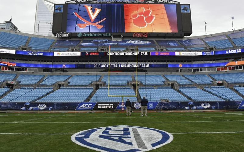 The ACC Championship logo is displayed on the field before kickoff at Bank of America Stadium on Dec. 6, 2019, in Charlotte, N.C. The Atlantic Coast Conference announced an updated covid-19 rescheduling policy on Thursday that means teams unable to play scheduled games because of pandemic-related protocols on its roster will be forced to forfeit. The policy will affect teams in football, field hockey, men’s and women’s soccer and volleyball. (AP FILE)
