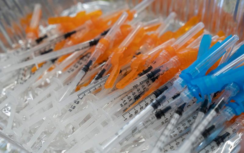 Syringes full of the Pfizer vaccine are ready to go at Oakland University as they hold a Covid vaccine clinic for 18-24-year olds on April 13. (TRIBUNE NEWS SERVICE)