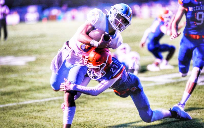 Branford defensive back Brice Criggall (27) lays out for a tackle against Chiefland during the teams’ Preseason Classic on Aug. 20. (BRIAN LEWIS/Special to the Reporter)