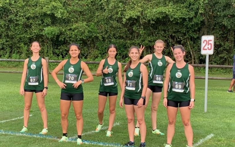 FGC runners Kayla Desmartin (from left), Merlin Leal, Kyla Desmartin, Savana Thomas, Ariel Anderson and Fallon Flynn are pictured at the starting line prior to Saturday's TCC Open. (COURTESY)