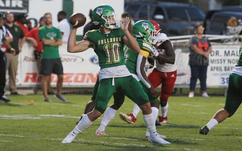 Suwannee quarterback Kodi Lang throws a pass against Hamilton County during the Preseason Classic on Aug. 20. (PAUL BUCHANAN/Special to the Reporter)