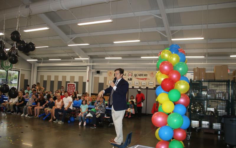 Belmont Academy principal Ron Barker addresses parents and students at the school’s back to school bash. (TONY BRITT/Lake City Reporter)