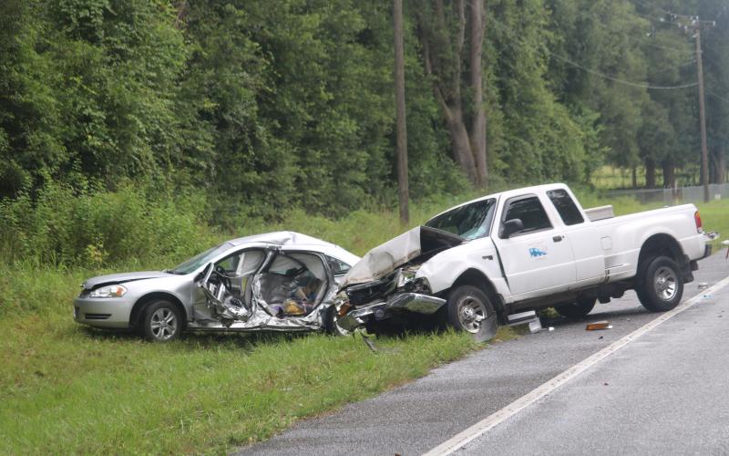 A pickup truck and a sedan collided around 3:42 p.m. on Monday afternoon on State Road 47, causing the death of a 65-year-old High Springs woman. (TONY BRITT/Lake City Reporter)