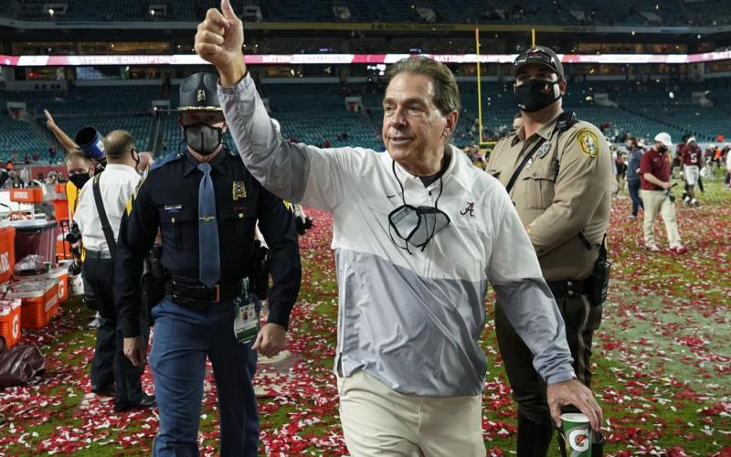 Alabama head coach Nick Saban leaves the field after the Crimson Tide’s win over Ohio State in the College Football Playoff national championship game on Jan. 12 in Miami Gardens. Another college football season will start with everyone chasing the Tide. Alabama is No. 1 in The Associated Press Top 25 preseason college football poll released on Aug. 16. (AP FILE)