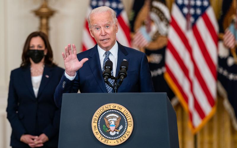 President Joe Biden delivers remarks on the Senate approving H.R. 3684 Infrastructure Investment and Jobs Act, in the East Room of the White House on Tuesday in Washington, D.C. (KENY NISHIMURA/Los Angeles Times/TNS)