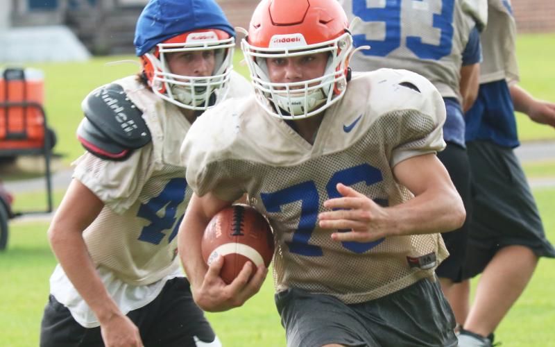 Branford running back Bodhi White takes off up the field during practice on Wednesday. (JAMIE WACHTER/Lake City Reporter)