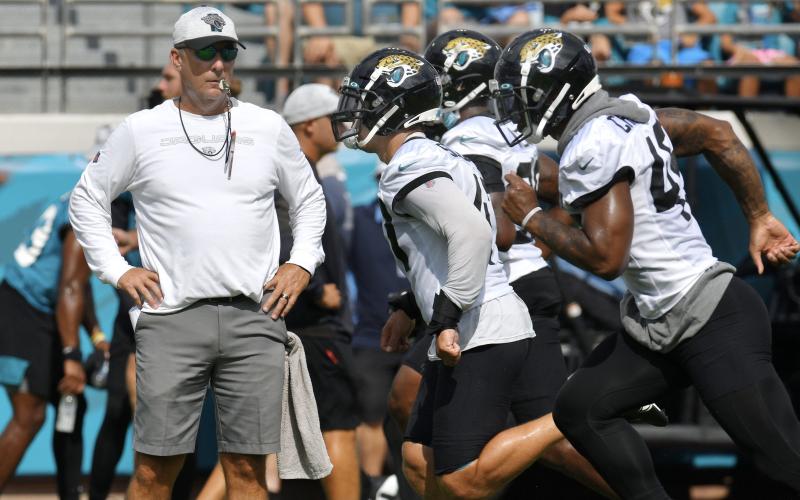 Jacksonville Jaguars head coach Urban Meyer watches his defense run through drills at TIAA Bank Field. (TRIBUNE NEWS SERVICE)