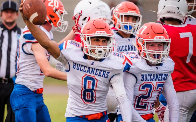 Branford's Josue Sierra (8) and Brice Criggall (27) celebrate after Sierra recovers a fumble against Williston on Aug. 27. (BRIAN LEWIS/Special to the Reporter)
