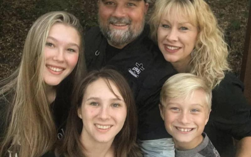 James “Skipper” Hair and his family, Linzie, Gracie, Fisher and Crystal, pose for a family portrait. (COURTESY)