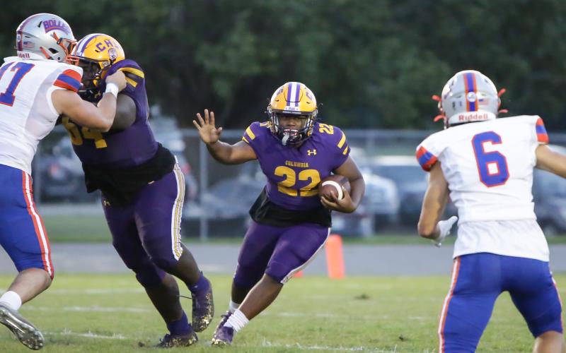 Columbia running back Tony Fulton looks for running room against Bolles on Friday night. (BRENT KUYKENDALL/Lake City Reporter)