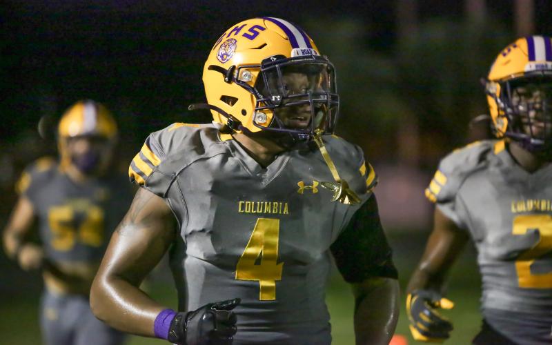 Columbia running back Jaelin Brown jogs off the field after scoring a touchdown against Englewood on Sept. 17. (BRENT KUYKENDALL/Lake City Reporter)