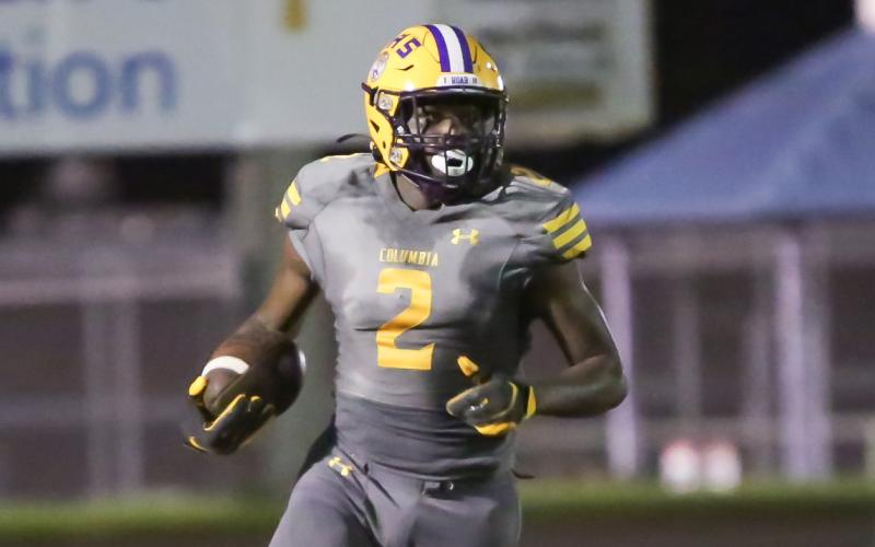 Columbia receiver Marcus Peterson runs up the field after a catch against Englewood on Sept. 17. (BRENT KUYKENDALL/Lake City Reporter)