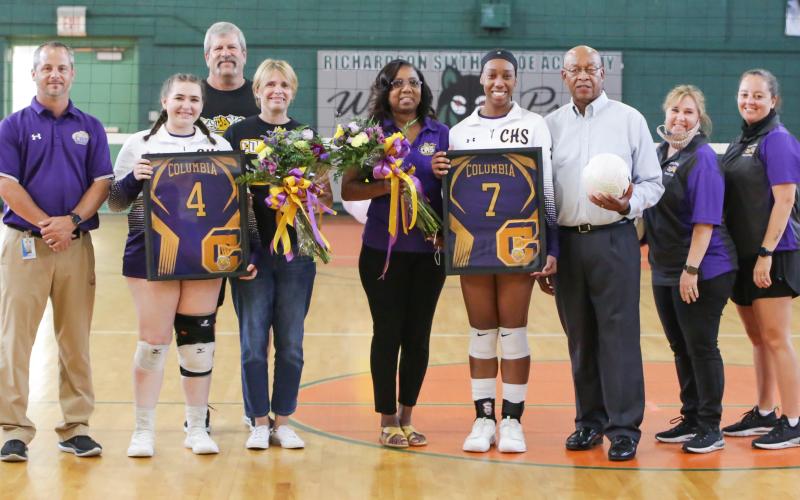 Columbia seniors Danielle Thomson (4) and Brandi Oliver (7) were honored for Senior Night prior to Tuesday’s match against Fort White. (BRENT KUYKENDALL/Lake City Reporter)