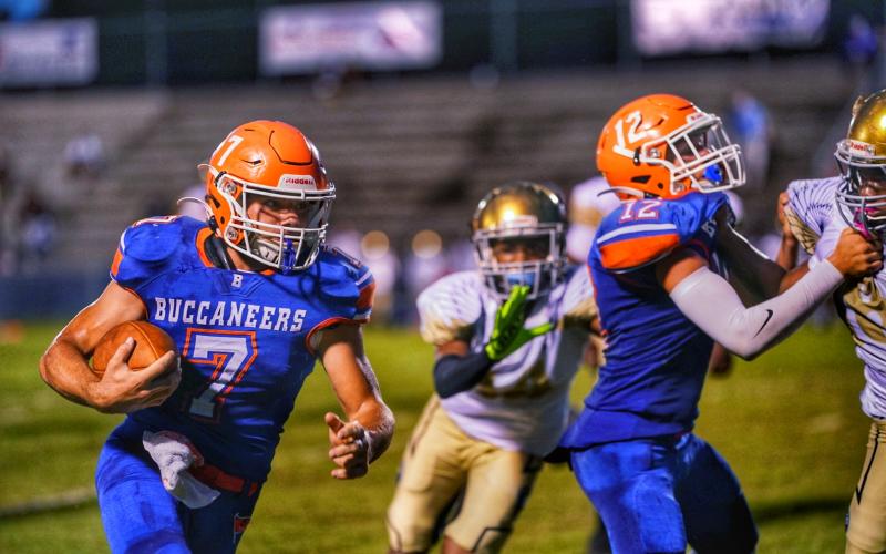 Branford running back Bodhi White takes a carry up the field against Zarephath Academy on Friday night. (BRIAN LEWIS/Special to the Reporter)