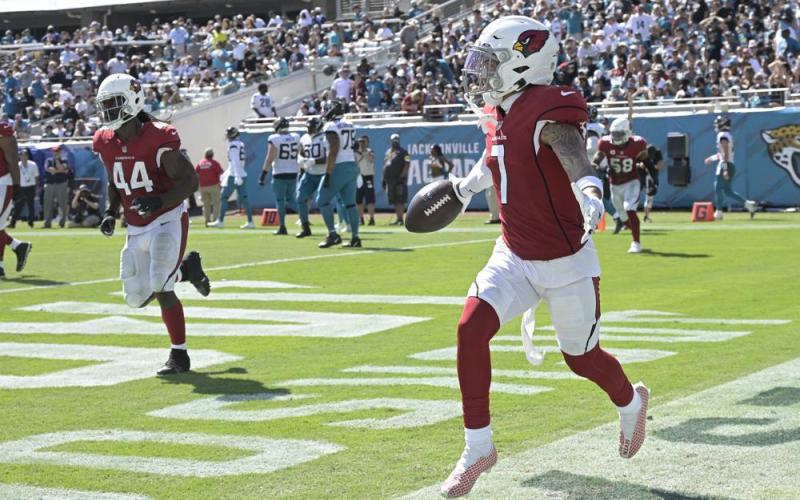 Arizona Cardinals cornerback Byron Murphy (7) celebrates his pick-6 against the Jacksonville Jaguars on Sept. 26 in Jacksonville. (PHELAN M. EBENHACK/Associated Press)
