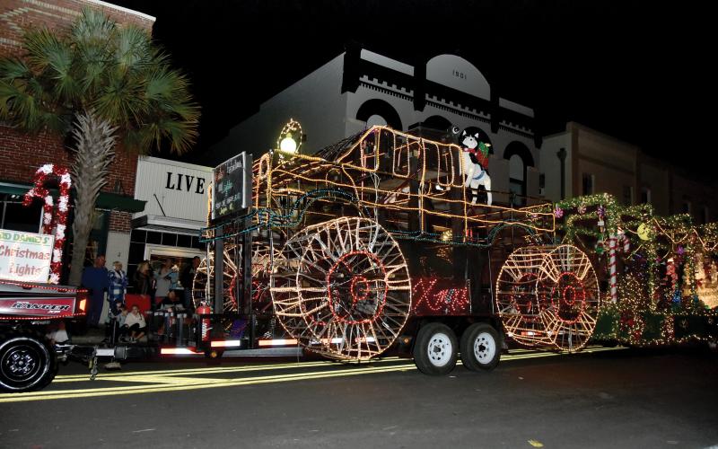A parade float rolls down the street at last December’s Christmas on the Square in Live Oak. (FILE)