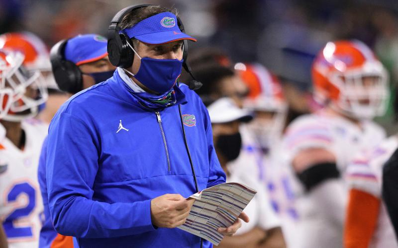 Florida head coach Dan Mullen looks on against the Oklahoma Sooners during Cotton Bowl at AT&amp;T Stadium on Dec. 30, 2020, in Arlington, Texas. (RONALD MARTINEZ/Getty Images/TNS)