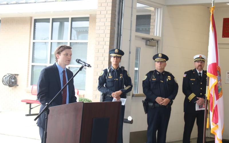 Staz Guntek, a legislative aide for Rep. Chuck Brannan, talks about his eyewitness account of the 9/11 attacks on Thursday. (TONY BRITT/Lake City Reporter)