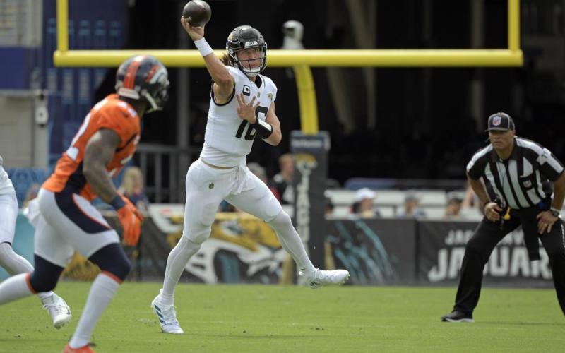 Jacksonville Jaguars quarterback Trevor Lawrence throws a pass against the Denver Broncos on Sept. 19 in Jacksonville. (PHELAN M. EBENHACK/Associated Press)
