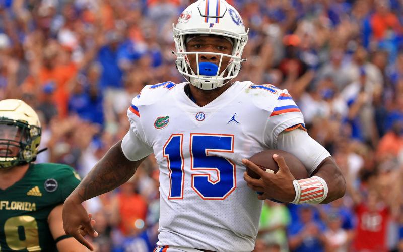 Florida Gators quarterback Anthony Richardson (15) rushes for a fourth-quarter touchdown against South Florida at Raymond James Stadium on Sept. 11 in Tampa. (MIKE EHRMANN/Getty Images/TNS)