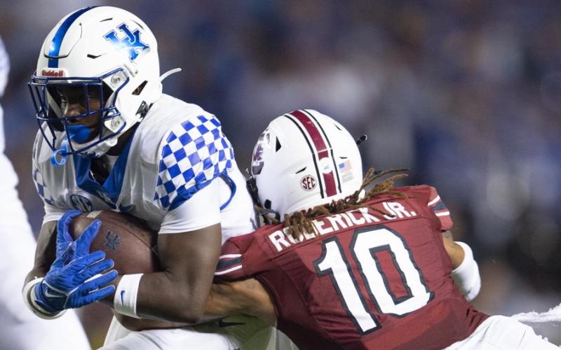 South Carolina defensive back R.J. Roderick (10) tackles Kentucky running back Kavosiey Smoke at Williams-Brice Stadium on Sept. 25 in Columbia, S.C. (HAKIM WRIGHT SR./Associated Press)