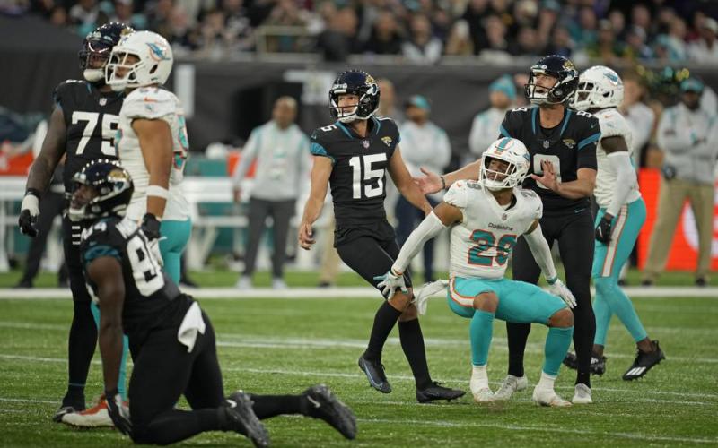 Jacksonville Jaguars kicker Matthew Wright (15) looks up as he kicks a game-winning field goal to beat the Miami Dolphins at the Tottenham Hotspur stadium on Oct. 17 in London, England. (MATT DUNHAN/Associated Press)