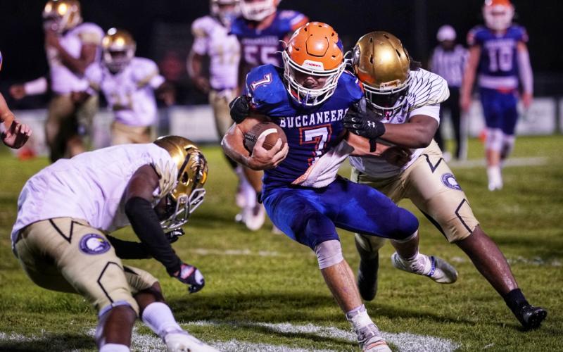 Branford running back Bodhi White is tackled by Zarephath Academy on Sept. 17. (BRIAN LEWIS/Special to the Reporter).