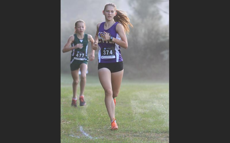 Columbia runner Audrey Fender won the girls race at the Suwannee Invitational on Saturday. (PAUL BUCHANAN/Special to the Reporter)