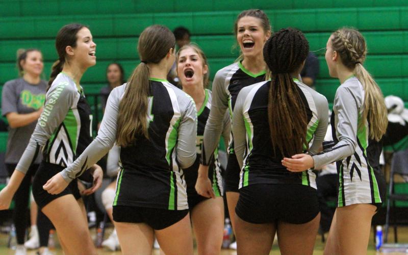 Suwannee celebrates a point against Columbia on Wednesday. (PAUL BUCHANAN/Special to the Reporter)