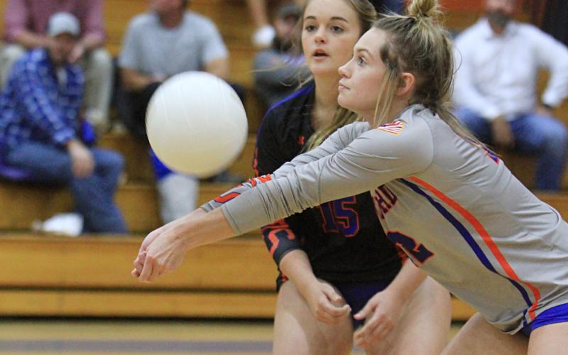 Branford libero Halleigh Ray Harris returns a shot against Taylor County during the District 5-1A semifinals on Oct. 19. (PAUL BUCHANAN/Special to the Reporter)