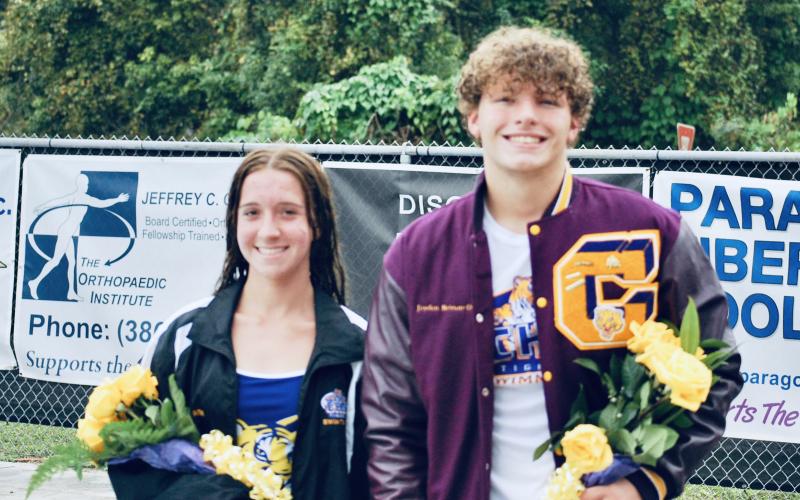 Columbia swimmers Nevaeh Ross (left) and Jayden Drew (right) were recognized on Senior Night during Thursday’s meet against Suwannee. (COURTESY)