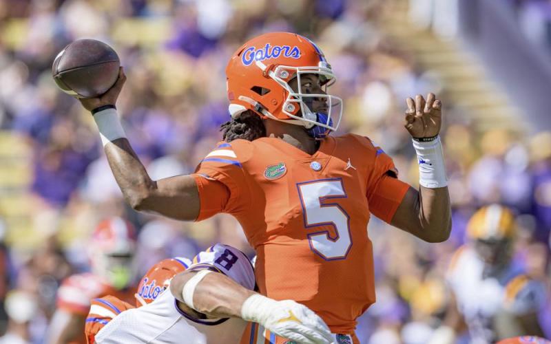Florida quarterback Emory Jones (5) is pressured by LSU defensive end BJ Ojulari (8) on Oct. 16 in Baton Rouge, La. (MATTHEW HINTON/Associated Press)