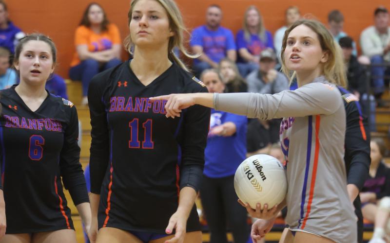 Branford libero Halleigh Ray Harris (right) questions a call during Tuesday’s Region 3-1A semifinal against Bell. (PAUL BUCHANAN/Special to the Reporter)