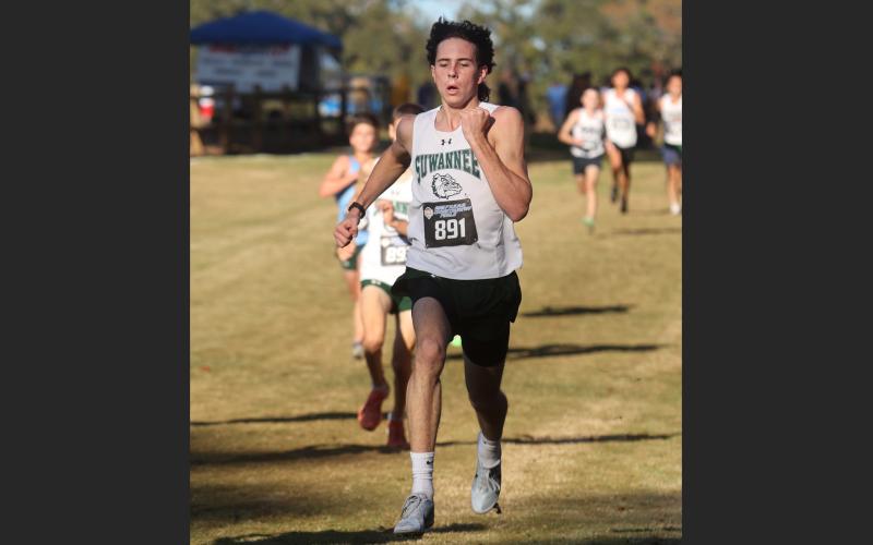 Suwannee runner Jesse Cushman runs at the Class 2A State Meet at Apalachee Regional Park on Friday in Tallahassee. (PAUL BUCHANAN/Special to the Reporter)