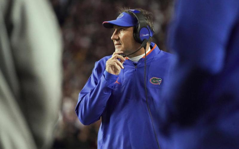 Florida head coach Dan Mullen watches from the sideline during the a game against South Carolina on Nov. 6 in Columbia, S.C. (SEAN RAYFORD/Associated Press)