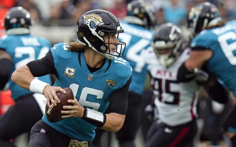Jacksonville Jaguars quarterback Trevor Lawrence looks for a receiver against the Atlanta Falcons during Sunday’s game in Jacksonville. (CHRIS O’MEARA/Associated Press)
