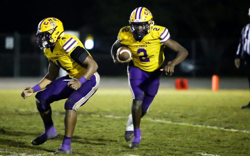 Columbia receiver Marcus Peterson rushes up the field against Riverside during Friday’s Region 1-6A quarterfinal. (BRENT KUYKENDALL/Lake City Reporter)