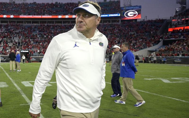 Florida head coach Dan Mullen walks off the field after a loss to Georgia on Oct. 30 in Jacksonville. (PHELAN M. EBENHACK/Associated Press)